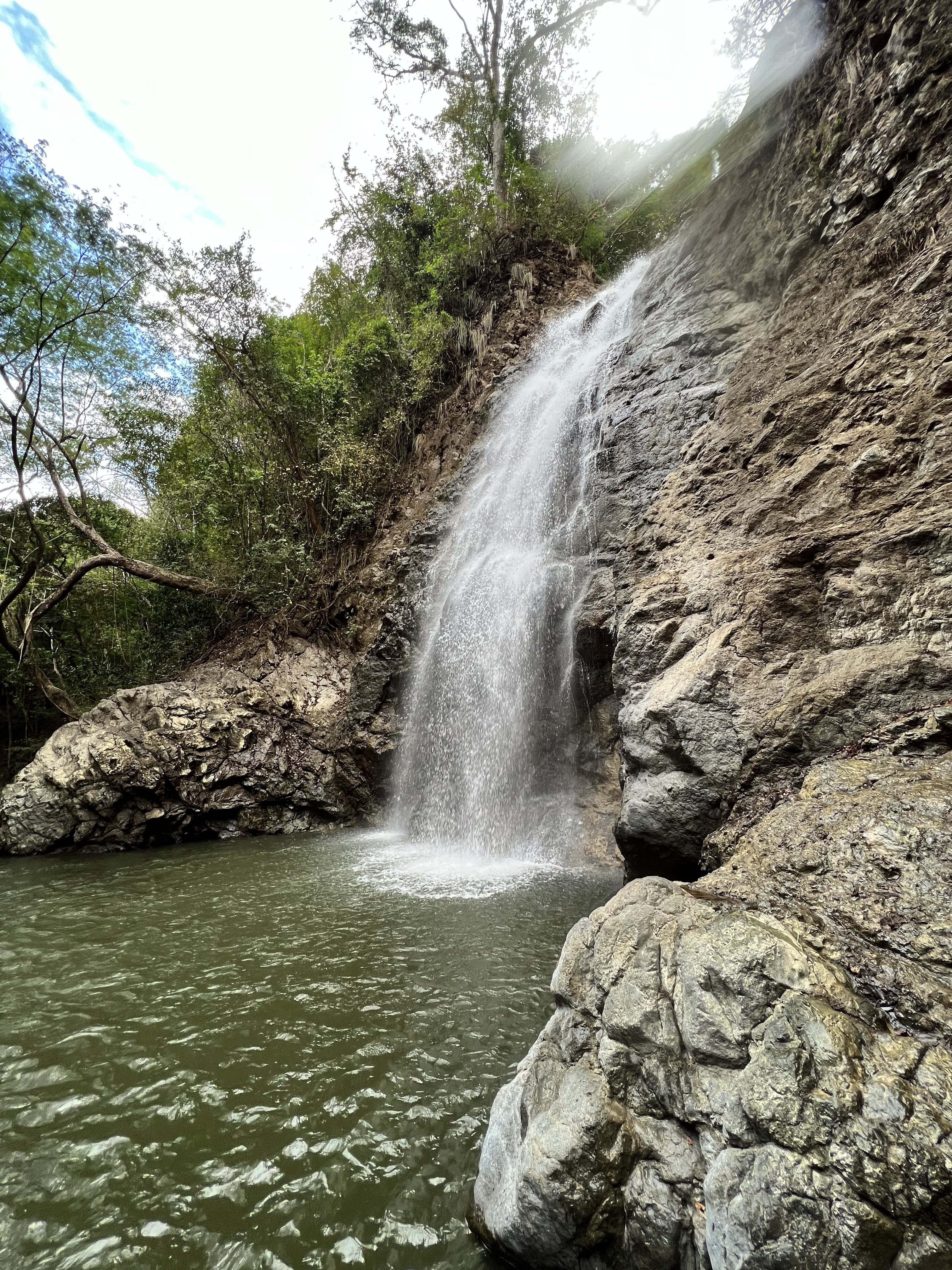 Montezuma Waterfall in Costa Rica surrounded by lush jungle